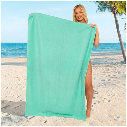 Refreshing aqua beach towel showcasing a vibrant coastal-inspired color and a soft lightweight touch.