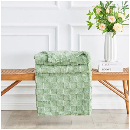 Bentley Jacquard Throw spread over sofa creating cozy living room vibe