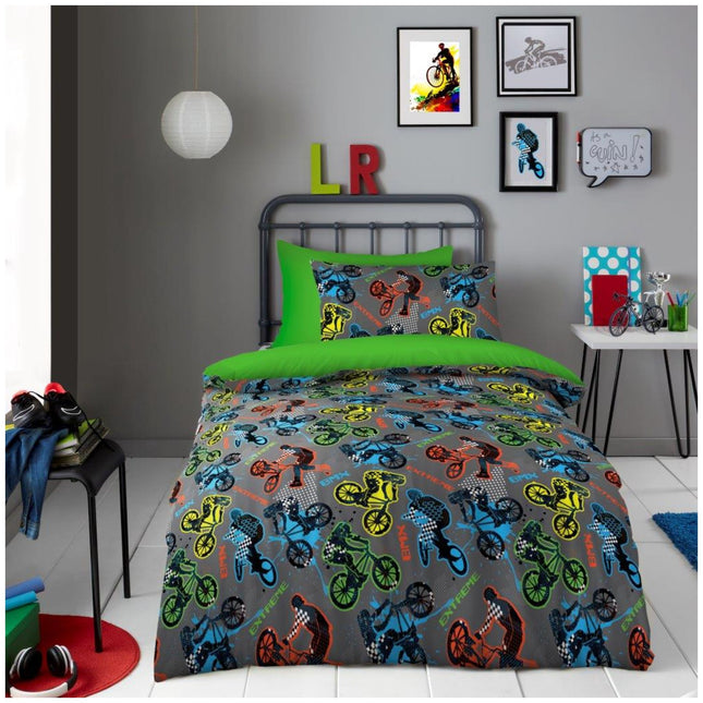 Bring excitement to your child’s bedroom with the BMX Stunts Kids Duvet Cover Set, featuring vibrant, action-packed graphics of BMX riders in bold colors like red, blue, green, and yellow on a cool gray background. Complete with a matching pillowcase, this dynamic set is perfect for young thrill-seekers and bike lovers. The high-energy design includes words like “BMX” and “EXTREME,” adding a sporty touch that inspires adventure and fun.