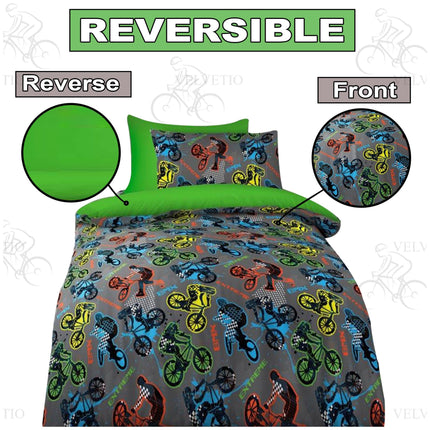 Energize your child’s room with the BMX Stunts Kids Duvet Cover Set, a vibrant and reversible bedding set designed for young adventure lovers. The front features bold, high-energy graphics of BMX cyclists in bright colors like red, yellow, green, and blue on a cool gray background, with words like “BMX” and “EXTREME” to inspire action.