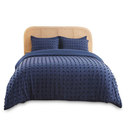 The Flynn Signature Duvet Cover Set brings modern charm to your space with its reversible design and soft, textured surface featuring stylish tufted dot detailing. Made with breathable, lightweight fabric, this set offers cozy comfort and sophisticated flair all year round.

