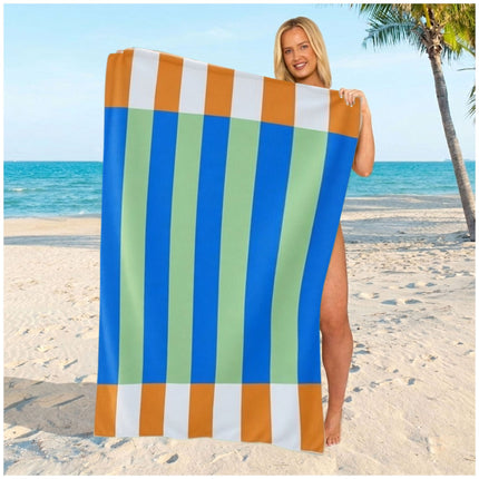 Blue striped sand-free beach towel crafted from lightweight, soft, and fast-drying microfiber fabric.