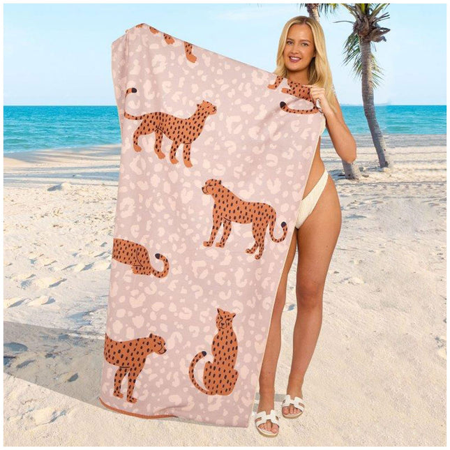 Unleash your wild side with this chic Brown Leopard beach towel, featuring a playful pattern of spotted leopards on a soft blush-toned background. Crafted for comfort and functionality, this towel is ultra-soft, absorbent, and quick-drying—making it perfect for sun-soaked beach days, poolside lounging, or adventurous getaways. Lightweight and stylish, it adds a touch of exotic flair to your summer essentials.

