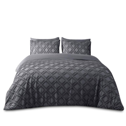 Add a layer of luxury and sophistication to your bedroom with the Edison Reversible Microfiber Duvet Cover Set. Designed with an elegant embossed diamond pattern, this duvet set is made from premium brushed microfiber for an incredibly soft feel and long-lasting durability. The reversible feature offers two stylish looks in one  a textured geometric pattern on one side and a smooth solid finish on the other. Perfect for contemporary bedrooms, guest rooms, or minimalist interiors.