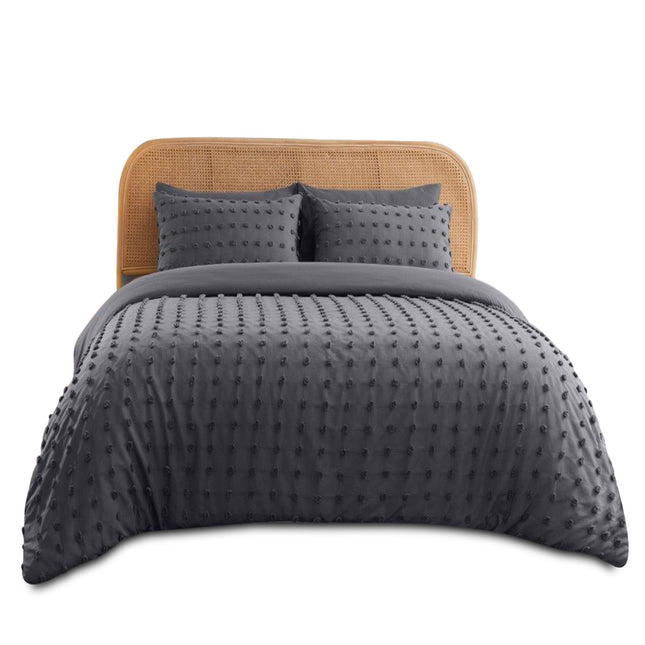 Add a modern touch of texture and sophistication to your bedroom with the Flynn Signature Duvet Cover Set in Charcoal Grey. Featuring a soft, breathable fabric and a stylish tufted dot pattern, this reversible set effortlessly blends comfort with contemporary design. The deep grey hue brings a sleek, calming vibe, while the included matching pillowcases complete the cohesive, upscale look. Perfect for year-round use, this set is both cozy and durable—making it an ideal choice for anyone look