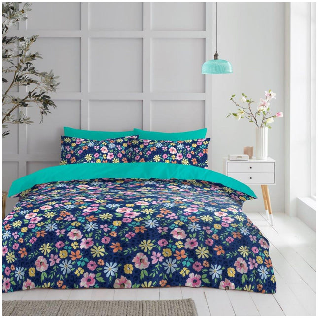 Adding to its visual richness, the bedding set captures a storybook charm through its intricate layering of color and form—each flower radiating joy, as if frozen in full bloom. The harmonious contrast between the vibrant petals and the tranquil blue background evokes a sense of serenity, like a wildflower garden under a twilight sky. The silky texture suggested in the fabric’s finish hints at indulgent comfort, making it as delightful to the touch as it is to the eye. 