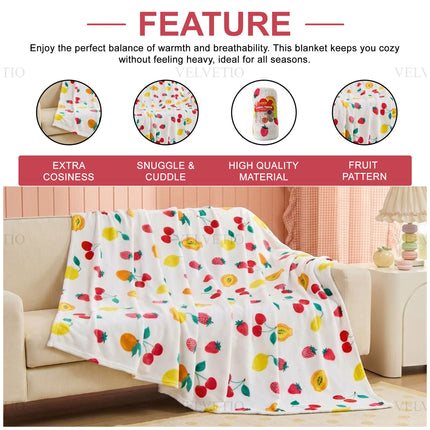 Floral Fruit Decorative Home Throw – Comfortable flannel blanket showcasing a unique fruit and flower-inspired pattern, ideal for relaxing at home, styling over furniture or adding an extra cosy layer to your bed.