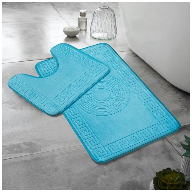 The image shows two blue bathroom mats that clearly emphasize both design and practicality. The first mat, rectangular in shape, features a Greek key border with a circular Greek key design at its center, offering a nod to classical aesthetics. The second mat is U-shaped, specifically designed to snugly fit around the base of a toilet, ensuring a coordinated look throughout the space.