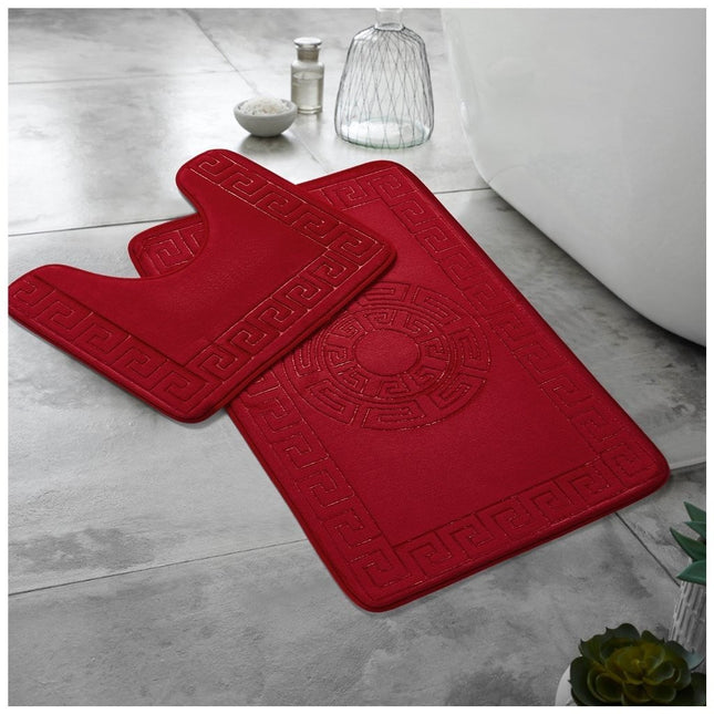 This image features two striking red bathroom rugs that merge classical elegance with functional design. The larger rug presents a rectangular shape with rounded corners, beautifully highlighted by an intricate Greek key border. At its center, a circular design draws the eye, adding a nod to timeless craftsmanship. Complementing this is the smaller U-shaped rug, tailored to gracefully fit around a toilet base while echoing the Greek key motif along its border.