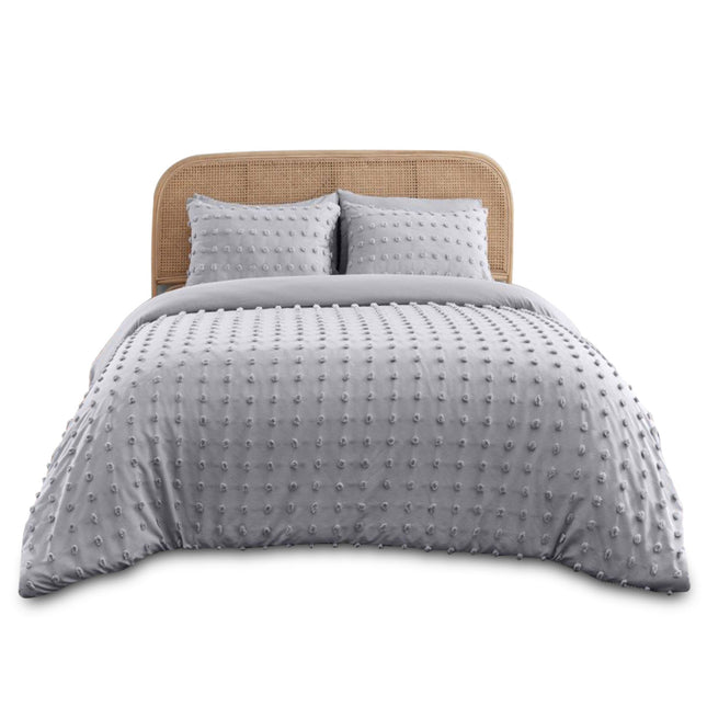 Refresh your bedroom with the airy elegance of the Flynn Signature Duvet Cover Set in Light Grey, a soft and stylish choice that brings a clean, contemporary feel to any space. Crafted from breathable, cozy fabric, this set features a charming tufted dot texture and a reversible design for easy styling. The light grey hue adds a calming, neutral touch that pairs effortlessly with any décor, while the matching pillowcases create a cohesive and polished look—perfect for creating a serene and inviting sleep 
