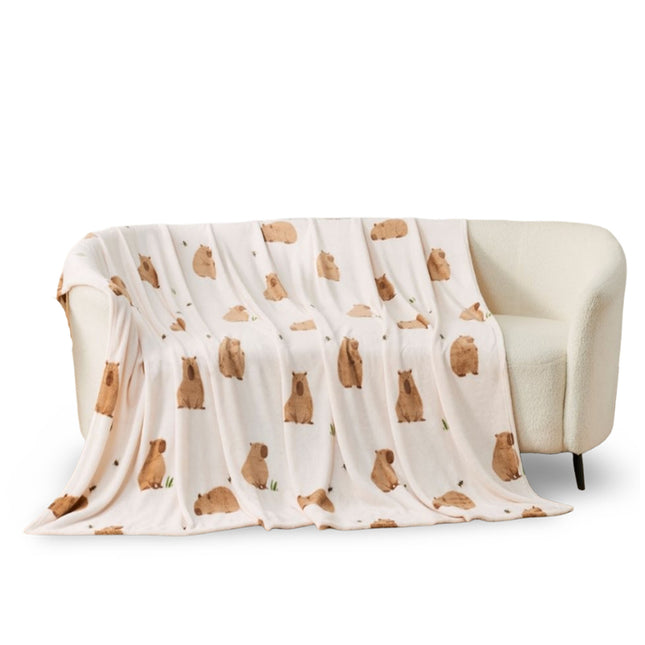 Happy Capybara Throw Blanket – Soft and cosy decorative home blanket featuring a cute capybara-inspired design, perfect for adding warmth, comfort and playful character to sofas, beds and armchairs.