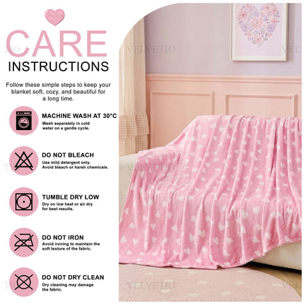 Cosy Heart Print Throw Blanket – Warm and comfortable decorative home throw featuring a beautiful heart motif, designed for everyday use while adding charm, softness and personality to your interior décor.