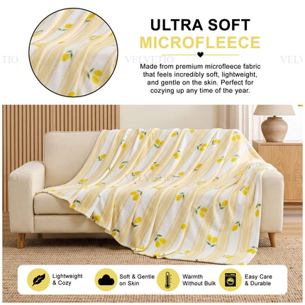 Decorative Fruit Design Lemon Throw – Cosy-looking home blanket with a fun citrus motif, designed to complement contemporary interiors while providing a practical decorative layer for beds, couches and armchairs.