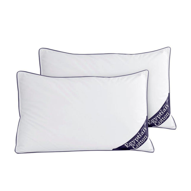 These white Egyptian cotton pillows feature a sophisticated navy blue trim, adding a refined touch to their design. Crafted from 100% Egyptian cotton, they provide exceptional softness and breathability, delivering a hotel-like sleeping experience at home. Filled with high-quality hollowfibre, they offer medium-firm support, promoting proper neck and spine alignment. Safe for sensitive skin and allergy sufferers, they are free from harmful chemicals and irritants. Available in flexible pack sizes, 