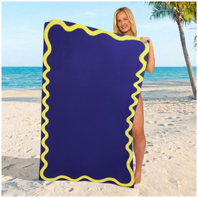  navy plain beach towel featuring a smooth microfiber finish and a spacious design for beach and pool relaxation.
