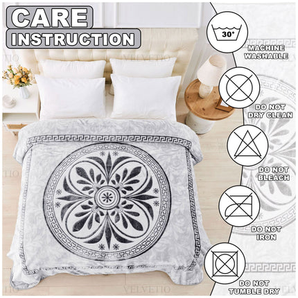 Machine Wash: Keep your throw in pristine condition by machine washing on a gentle cycle with cold water. Use a mild detergent to protect the fabric’s soft texture and intricate details.