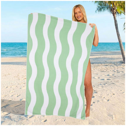 Large sage green wavy stripe beach towel with a calming design and soft microfiber texture for outdoor relaxation.
