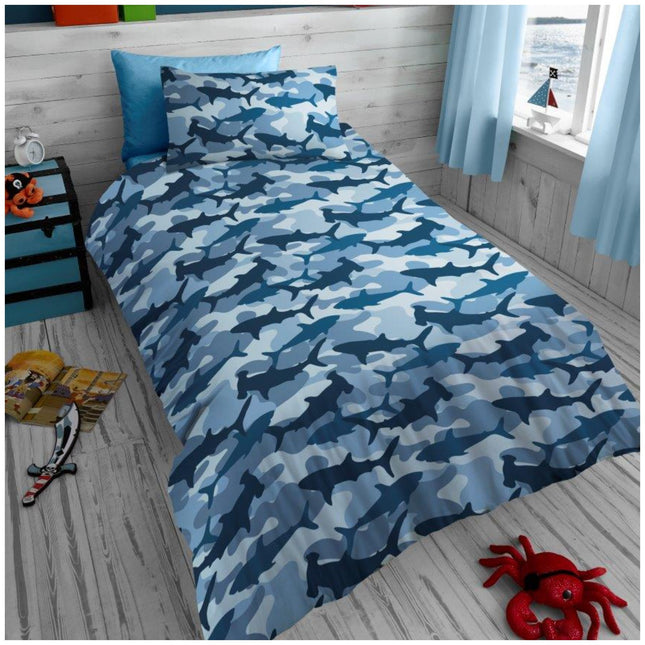 The set includes a matching pillowcase and a solid blue reversible side for a sleek, versatile look. Machine washable for easy care and designed to hold up through everyday use, this set combines playful style with practical function ideal for transforming any kid’s room into a shark lover’s dream.