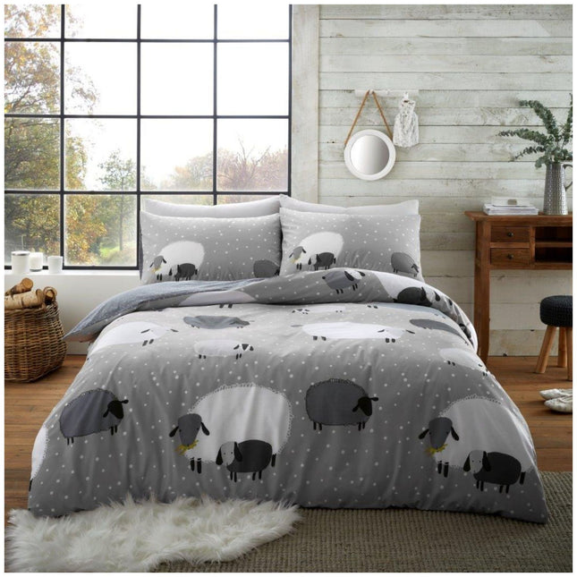 Add a playful touch to your bedroom with this cosy and stylish sheep-patterned duvet cover set, featuring a charming grey and white design with adorable cartoon sheep on a soft polka-dot background. Made from a comfortable polycotton blend, it’s breathable, durable, and easy to care for—perfect for year-round use. The reversible design offers two looks in one, and the set includes matching pillowcase(s) to complete the look. Ideal for both kids’ and adults’ bedrooms, this bedding brings warmth, whimsy,