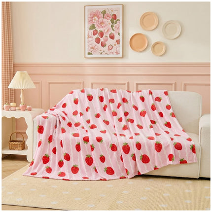Strawberry Flannel Blanket with a delightful strawberry design, perfect for bedrooms, lounges, chairs and relaxing areas looking for a cheerful home décor touch.