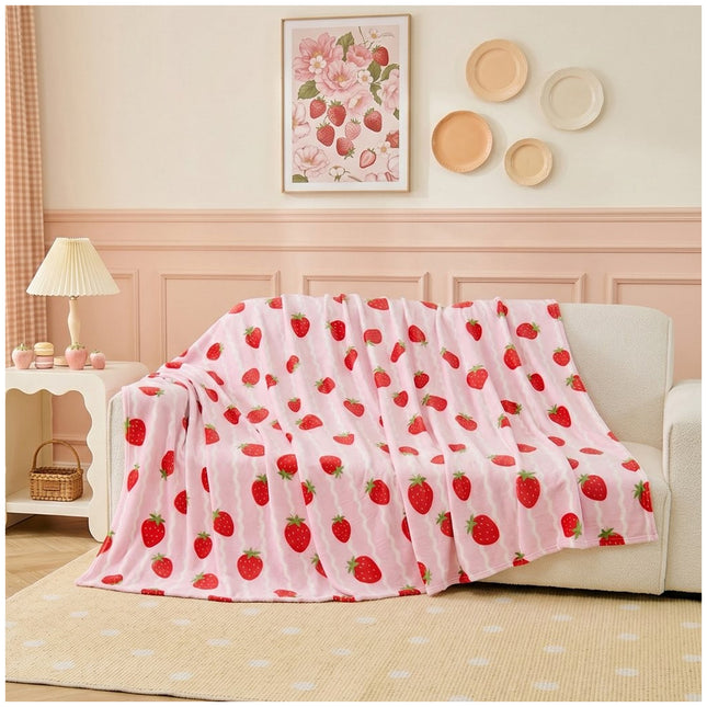 Strawberry Flannel Blanket with a delightful strawberry design, perfect for bedrooms, lounges, chairs and relaxing areas looking for a cheerful home décor touch.