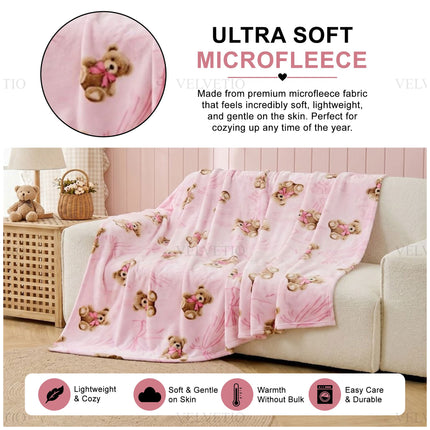Soft Flannel Throw with Teddy Bear and Bow Design, perfect for creating a welcoming decorative look across beds, sofas, chairs and relaxing spaces within the home.