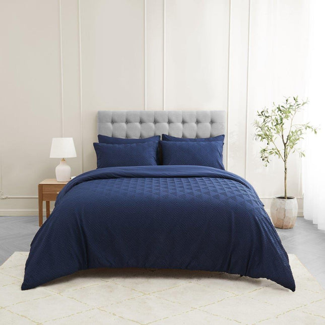 Experience ultimate softness, comfort, and durability with the TRURO TRIANGLE duvet set. Made from the luxurious Signature material, it offers a Plain reverse and a navy color that adds a touch of luxury to your bedroom decor. Upgrade your sleep experience now.