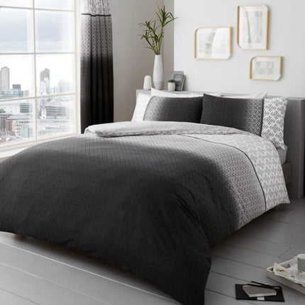 Elevate your bedroom with the PRINTED Urban Ombre Duvet Cover Set, featuring a bold gradient design that fades from deep charcoal to crisp white with subtle geometric detailing throughout. This modern, reversible bedding set brings an effortlessly stylish, city-living vibe to your space while offering the comfort of soft, breathable microfiber. Perfect for both minimalist and contemporary interiors, it’s available in Single, Double, and King sizes with matching pillowcases included for a complete, polished 