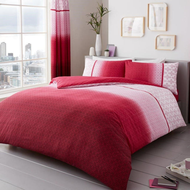 Add a vibrant touch to your bedroom with the PRINTED Urban Ombre Duvet Cover Set in Red, showcasing a striking gradient that blends bold crimson into soft blush tones with delicate geometric patterns throughout. This reversible design offers two fresh looks in one, crafted from soft, breathable microfiber for year-round comfort. Ideal for modern interiors or anyone wanting a pop of colour, the set includes matching pillowcases and is available in Single, Double, and King sizes for a complete, coordinated lo
