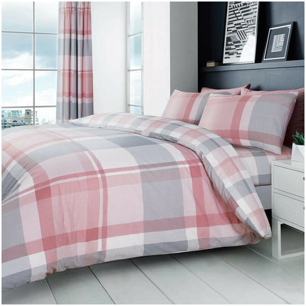 Add a touch of modern charm to your bedroom with this Printed Waverly Check Duvet Cover Set in soft pink and grey tones. The reversible design offers two contemporary looks in one, making it easy to refresh your space. Crafted from a cozy and durable 50% cotton, 50% polyester blend, this set includes matching pillowcases and is both breathable and easy to care for—ideal for everyday comfort with effortless style.