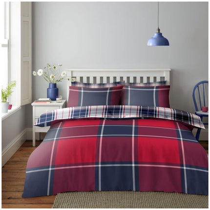 Add a bold and stylish touch to your bedroom with this Reversible Check Pattern Duvet Cover Set in Red and Navy, featuring a vibrant tartan design that brings warmth and character to any space. The reversible design offers a fresh alternative look with a crisp check pattern on the other side, allowing you to switch up your décor in seconds. Made from soft, easy-care microfiber, this bedding set ensures cozy comfort and effortless maintenance.