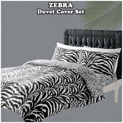 The Zebra Duvet Cover Set offers a bold and stylish design with striking zebra and leopard prints, perfect for adding a modern animal-inspired touch to your bedroom. Made from high-quality polycotton, this set ensures a soft, smooth, and hypoallergenic feel, providing comfort for sensitive skin. Its durable and machine-washable fabric makes it easy to maintain, combining practicality with eye-catching aesthetics for a cozy and fashionable bedding solution.